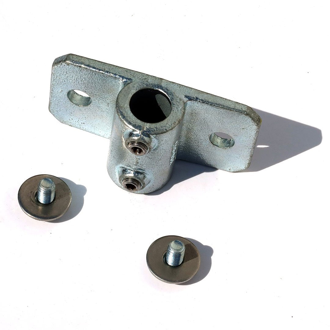 A single 34mm palm railing tube clamp with screws ans washers for bolting a 34mm steel tube to a shipping container using a domino clamp 
