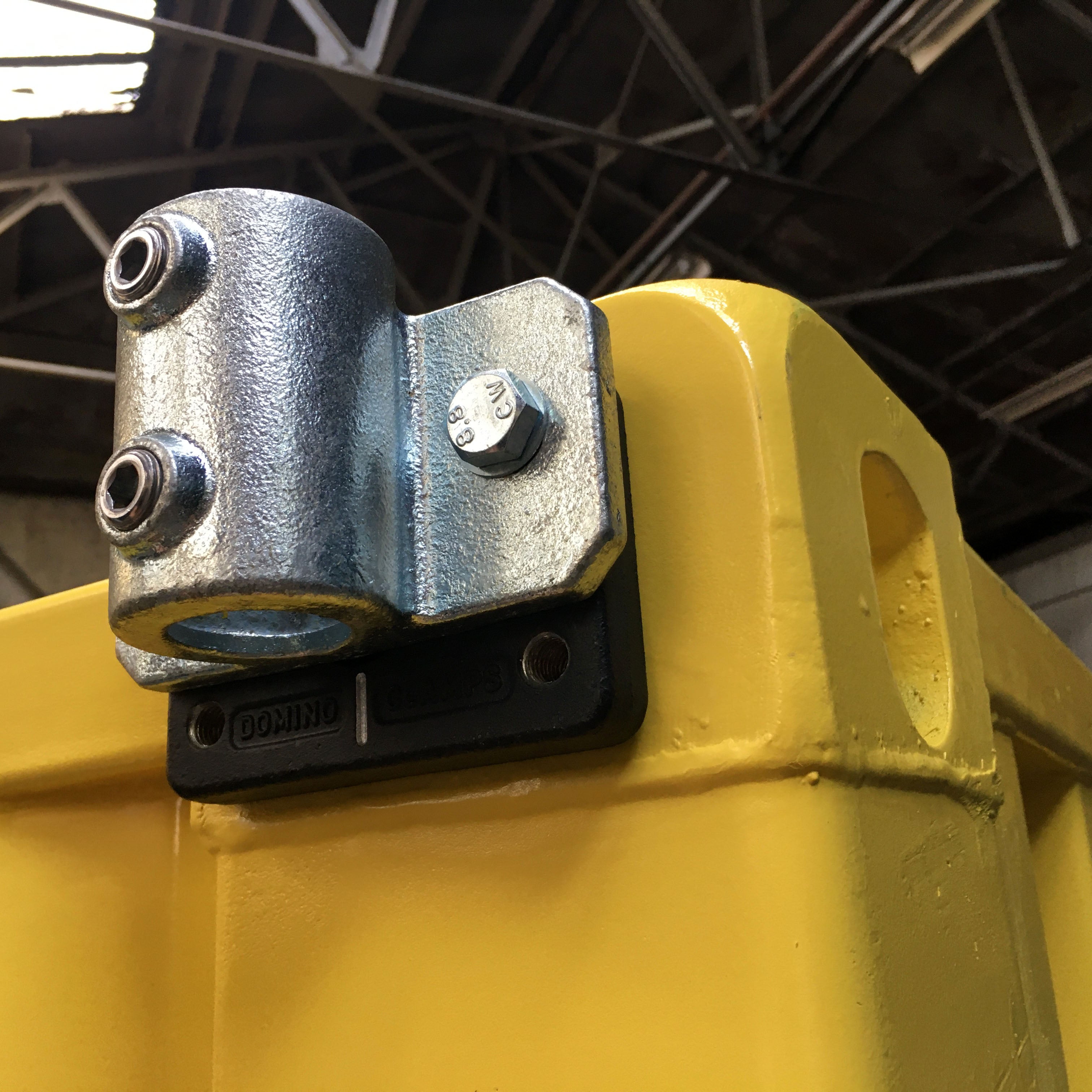 Vertical Tube Clamp - Undrilled 48mm attached to Shipping Container with Domino Clamp