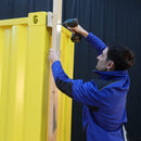 Person screwing a wood onto container 