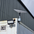 Starlink Kit attached to a shipping container side view