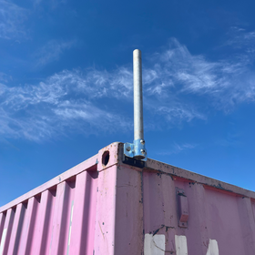 Utility Pole Kit attached to a Shipping Container