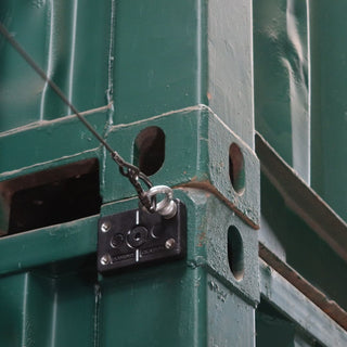 Eyebolt and wire attached to a shipping container