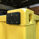 Side view of Domino Clamp attached to a shipping container