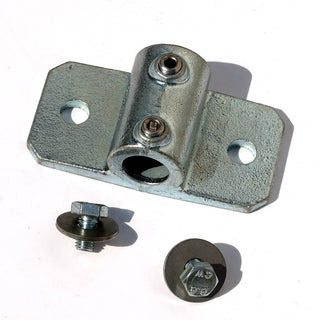 A single 34mm palm railing tube clamp with screws ans washers for bolting a 34mm steel tube to a shipping container using a domino clamp 